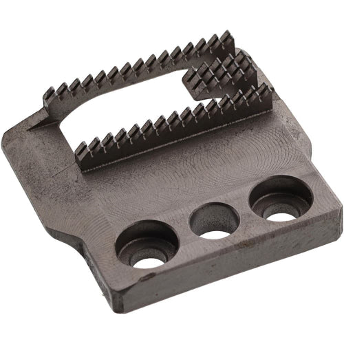 A black feed dog component for a Bernina sewing machine. A black feed dog component for a Bernina sewing machine.