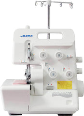 Juki MO-654DE Overlock Serger Machine, a white sewing machine with dials and controls on the top and front panels. Juki MO-654DE Overlock Serger Machine, a white sewing machine with dials and controls on the top and front panels.