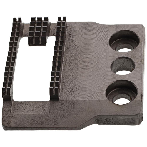 A black feed dog component for a Bernina sewing machine.