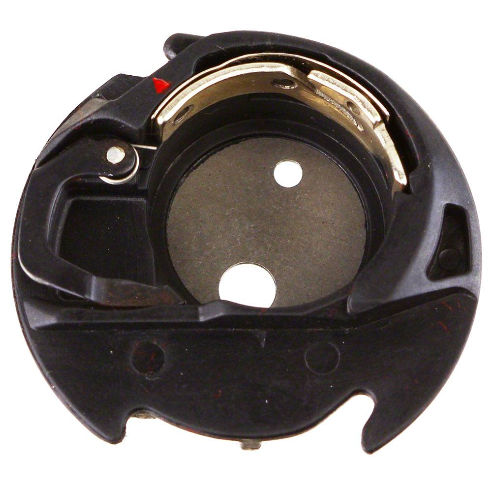 Black bobbin case for Janome sewing machines with visible metal parts and a red marking on one side.