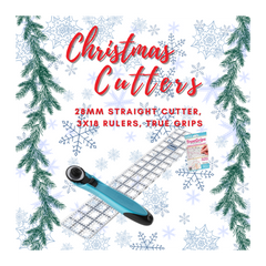 Christmas Cutters set with cutter, rulers, and True Grips on a decorative background with Christmas trees and snowflakes.
