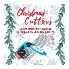 Bluecut Christmas Cutters with ruler and TrueGrips on a decorative background with Christmas trees and snowflakes.