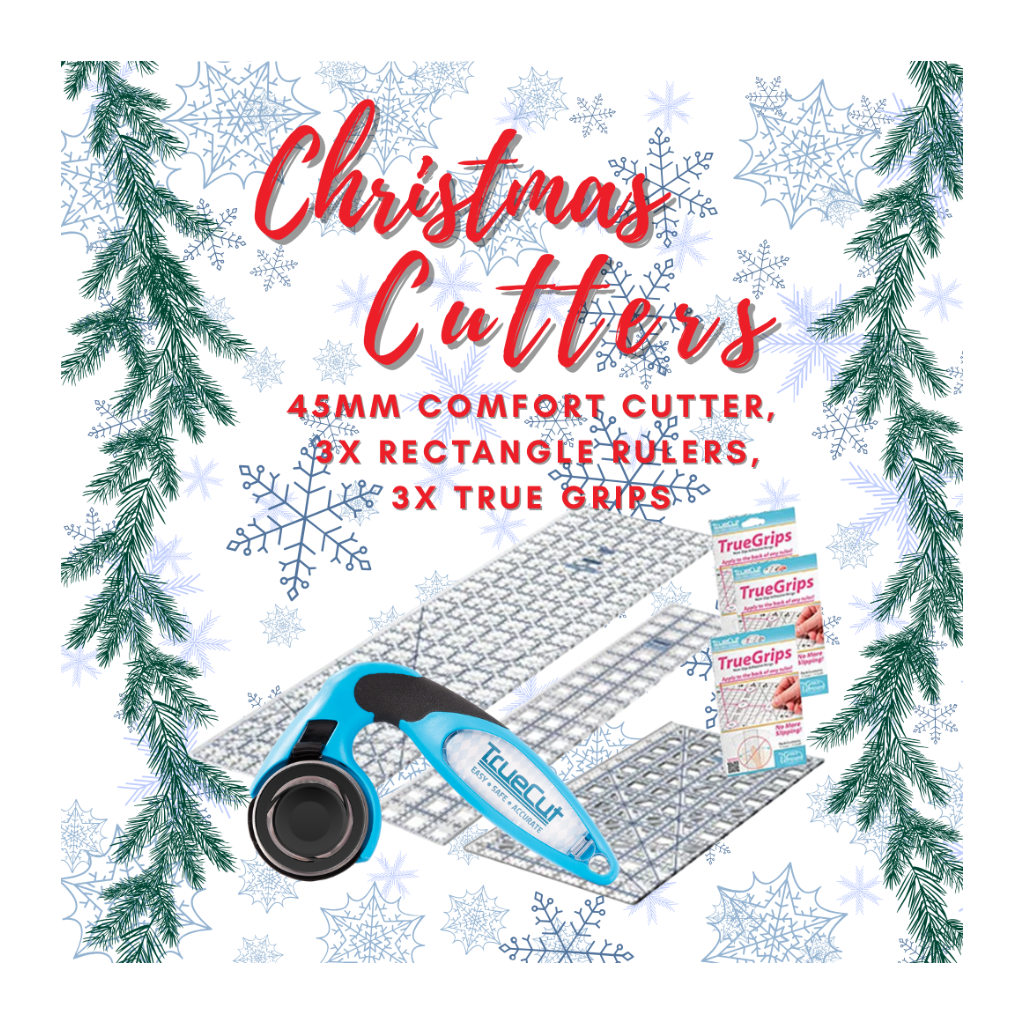 Set of Christmas Cutters with tools and packaging on a decorative background