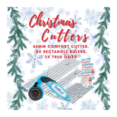 Set of Christmas Cutters with tools and packaging on a decorative background