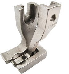 Metal sewing machine foot on a white background
