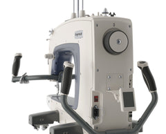 Q"Nique sewing machine model 16X on a white background