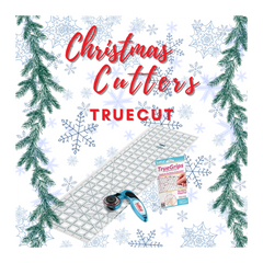 Christmas-themed product image with cutting mat, rotary cutter, and TrueGrips packaging on a snowy background.