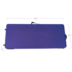 A purple rectangular quilting mat with the brand name 'HandiQuilter' embossed in the center, shown with dimension lines and labels indicating 53.2 inches by 22.