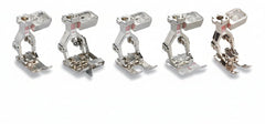 Set of five metal sewing machine presser feet on a white background